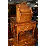 A REPRODUCTION LOW OAK SIDE TABLE with a single drawer and undershelf, together with a matching