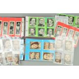 A COLLECTION OF APPROXIMATELY SIX HUNDRED AND FORTY FOUR CIGARETTE CARDS IN SIXTEEN SETS AND IN