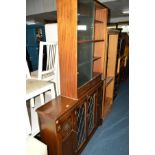 A REPRODUX OAK LEAD GLAZED BOOKCASE, width 134.5cm x depth 28cm x height 99cm, together with a