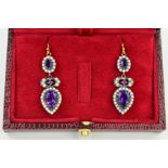 A PAIR OF AMETHYST, SEED PEARL AND DIAMOND EARRINGS, each designed as a pear shape amethyst within a