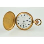 A ROLLED GOLD FULL HUNTER POCKET WATCH, the Thomas Russell & Son pocket watch with white dial, Roman
