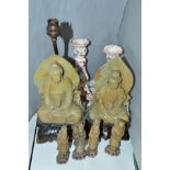 A NEAR PAIR OF SEATED SOAPSTONE ORIGINAL FIGURES, (one converted to a lamp base), height tallest