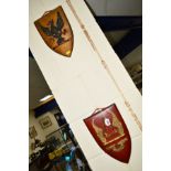 TWO CAST SHIELD SHAPED HERALDIC CRESTS, 31.5cm x 20.5cm (2)