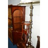 A REPRODUCTION MAHOGANY OPEN CORNER CUPBOARD (key), a mahogany wig stand and brass standard lamp