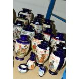 VARIOUS COBALT BLUE SATSUMA VASES, of graduating heights, mostly of Geisha girls, tallest