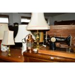 A COPPER RAILWAY LAMP, an oak cased Haid and Neu sewing machine (key) and four various table lamps