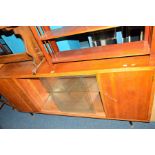 AN OAK BOOKCASE with glazed doors, width 172cm