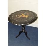 A VICTORIAN PAPIER MACHE TILT TOP TEA TABLE, of a shaped oval form, black lacquered mother of