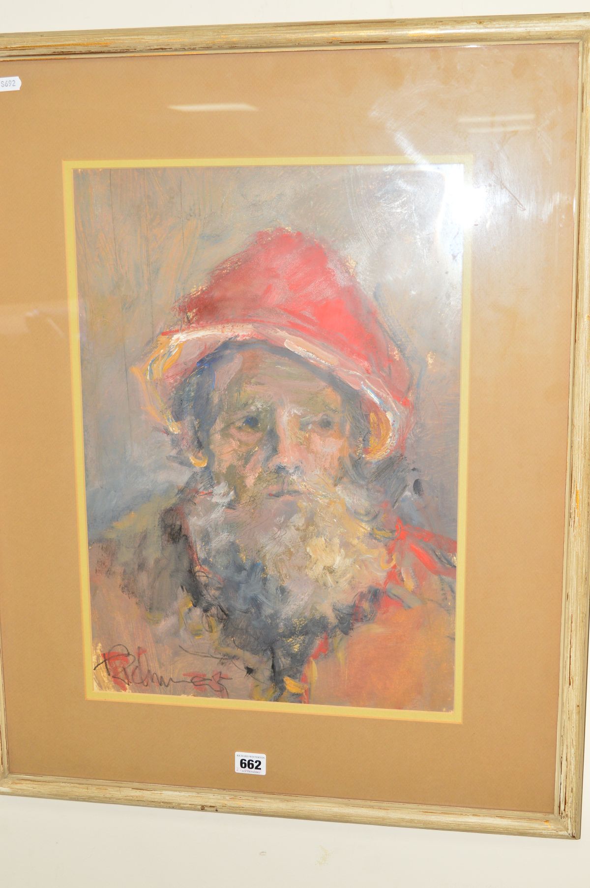 A HEAD AND SHOULDERS PORTRAIT OF AN ELDERLY MAN WEARING A RED HAT, indistinctly signed (