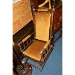 AN EDWARDIAN OAK AMERICAN ROCKING CHAIR