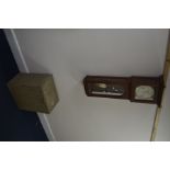 A MODERN MAHOGANY WALL CLOCK, marked Sligh (winding key) and a Lloyd Loom blanket chest (2)