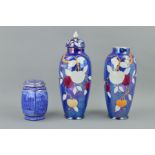 A PAIR OF BLENHEIM ART WARE LUSTRE COVERED VASES, approximate height 30cm (one missing lid and