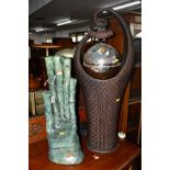 TISSYWU, a green glazed hand sculpture, height 63.5cm, together with a water fountain (2)