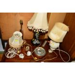 AN EDWARDIAN OAK BAROMETER and four other table lamps (5)