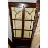 AN EDWARDIAN MAHOGANY ASTRAGAL GLAZED TWO DOOR CORNER CUPBOARD, painted interior, double cupboard