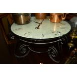 A MODERN WROUGHT IRON CIRCULAR COFFEE TABLE with a battery power clock, diameter 75cm x height 44cm