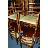 A MODERN MAHOGANY DROP LEAF PEDESTAL TABLE and a set of six oak ladder back chairs (7)