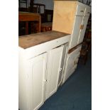A PAINTED PINE THREE DOOR CABINET, together with two painted kitchen cabinets (3)