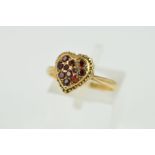 A LATE 20TH CENTURY GARNET CLUSTER RING, ring size M, stamped '9ct', approximate gross weight 2.3