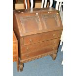 AN OAK FALL FRONT BUREAU with two drawers and an oak hanging corner cupboard (key) (2)