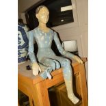 A PAINTED COMPOSITION JOINTED LADY FIGURE, modelled in a seated position in the 19th Century style ,