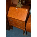 A WALNUT LADIES BUREAU, with two drawers on cabriole legs