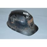 A VINTAGE MINERS HELMET, not marked but possibly a Huwood 'Light Type Hat', circa mid 20th century
