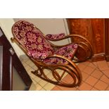 A BENTWOOD OAK ROCKING CHAIR with floral velvet upholstery