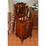 A VICTORIAN CARVED WALNUT COAL PURDONIUM, the swan neck pediment above a single shelf and shaped