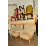 A LIGHT OAK FRAMED BEIGE UPHOLSTERED THREE PIECE SUITE, comprising of a three seater settee and