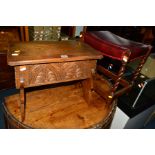 A SMALL CARVED OAK LIDDED CHEST, together with an oak stool (2)