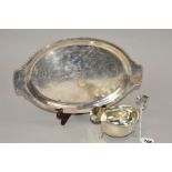 AN EARLY 20TH CENTURY SILVER PLATED TWIN HANDLED TRAY, engraved with a mid 18th Century tavern