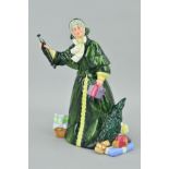 A ROYAL DOULTON FIGURE 'Christmas Parcels' HN2851