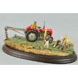 A BOXED LIMITED EDITION COUNTRY ARTISTS FIGURE GROUP, 'Securing The Field' (Massey Ferguson 35),