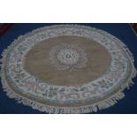 A CHINESE CIRCULAR RUG, russet ground, diameter 182cm