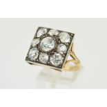 AN EARLY 20TH CENTURY LARGE ZIRCON DRESS RING, square head measuring approximately 17.8mm in