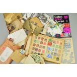A QUANTITY OF STAMPS, in an album and loose, with duplicated used Q.V. Great Britain