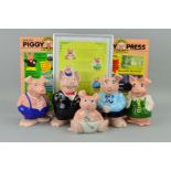 A SET OF FIVE WADE NATWEST PIGGY BANKS, together with a framed Natwest poster and two 'Natwest