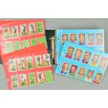 A COLLECTION OF APPROXIMATELY FOUR HUNDRED AND SEVENTY FIVE SPORTING THEMED CIGARETTE CARDS IN TEN