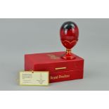 A BOXED ROYAL DOULTON LIMITED EDITION FLAMBE EGG, No2438/3500, total height of egg in cup is 14cm (