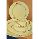 CLARICE CLIFF FOR WILKINSON LTD, a part dinner service, to include 'Honeyglaze' sauce boat, an