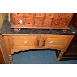 AN EDWARDIAN SATINWOOD MARBLE TOPPED WASHSTAND with a tiled back