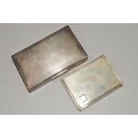 TWO EARLY TO MID TWENTIETH CENTURY CIGARETTE POCKET CASES, and silver fronted cigarette box,