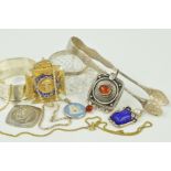 A SMALL SELECTION OF SILVER AND WHITE METAL ITEMS to include a pair of sugar tongs, a circular