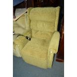 A GREEN UPHOLSTERED ELECTRIC RISE AND RECLINE ARMCHAIR