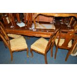 A REPRODUCTION MAHOGANY PULL OUT DINING TABLE, with two additional leaves, extended width 320cm x