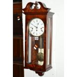 A MODERN MAHOGANY COMITTI OF LONDON WALL CLOCK (pendulum and certificate)