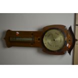 AN ART NOUVEAU WALNUT AND INLAID BAROMETER, marked Harrisons Opticians, Birmingham