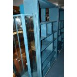 TWO LARGE PAINTED OPEN BOOKCASES, another similar open bookcase and a painted two door shop