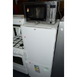 A LIEBHERR FRIDGE/FREEZER (height 137cm), together with a Panasonic microwave (2)